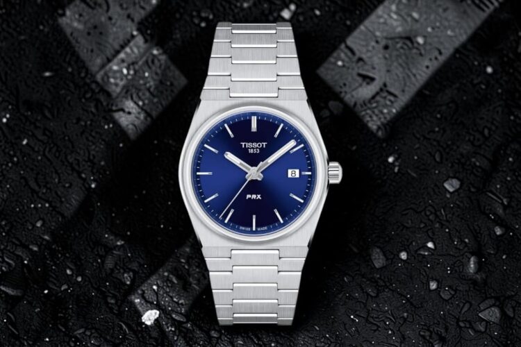 Tissot PRX 35 mm Quartz blu Tissot PRX 35 mm al quarzo con quadrante blu e bracciale integrato in acciaio.