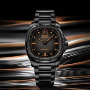 Mido Multifort TV Big Date PVD nero con dettagli arancioni, quadrante sfumato e bracciale integrato