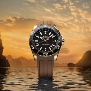 Mido Ocean Star GMT M026.629.37.291.00 in PVD oro giallo con quadrante nero e cinturino cioccolato.