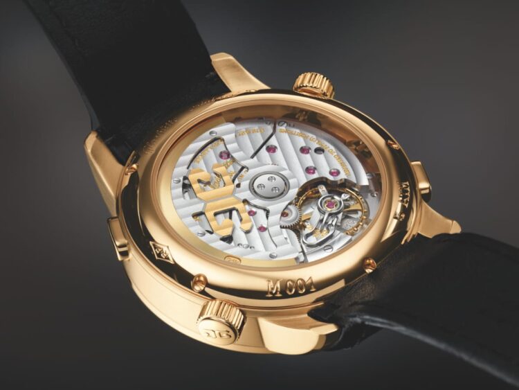 Movimento automatico Glashütte Original Calibro 100-13 visibile dal fondello del Senator Diary in oro rosa.