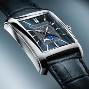 Dettaglio Frederique Constant Carrée Moonphase Automatic blu navy con guilloché chevron bicolore, fasi lunari e lancette dauphine argento su cassa acciaio lucido