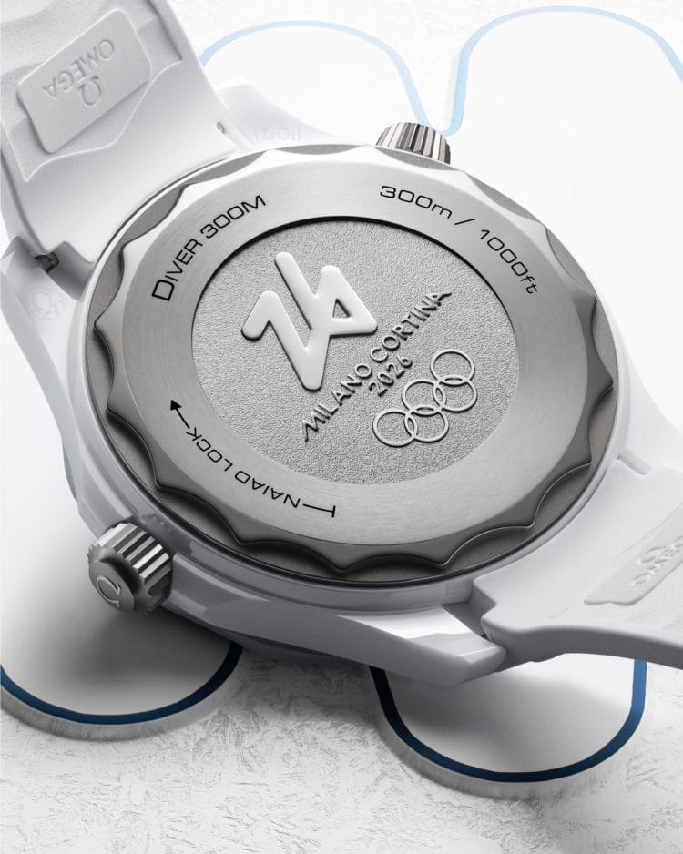 Fondello in titanio grado 5 Omega Seamaster Milano Cortina 2026 con logo "26" e anelli olimpici incisi.
