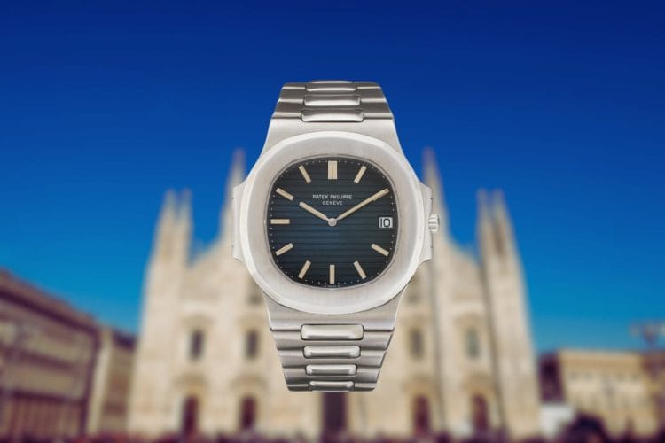 Concept visivo: Il Patek Philippe Nautilus originale incontra Milano in attesa del 50° anniversario nel 2026 Patek Philippe Nautilus originale Ref. 3700 del 1976 su sfondo sfocato del Duomo di Milano, in attesa del 50° anniversario nel 2026.
