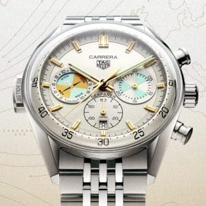 TAG Heuer Carrera Chronograph Seafarer con indicatore di marea, quadrante champagne e dettagli teal, vista frontale su bracciale.