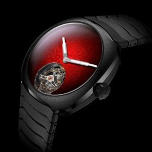 H. Moser & Cie. Streamliner Tourbillon Concept Ceramic, cassa e bracciale integrato in ceramica grigio antracite, quadrante in smalto Grand Feu Red fumé, tourbillon volante a ore 6.