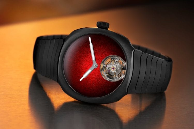 Streamliner Tourbillon Concept Ceramic – Quadrante in smalto Grand Feu Red fumé H. Moser & Cie. Streamliner Tourbillon Concept Ceramic, quadrante in smalto Grand Feu Red fumé con effetto martellato e tourbillon volante a ore 6, cassa in ceramica grigio antracite.