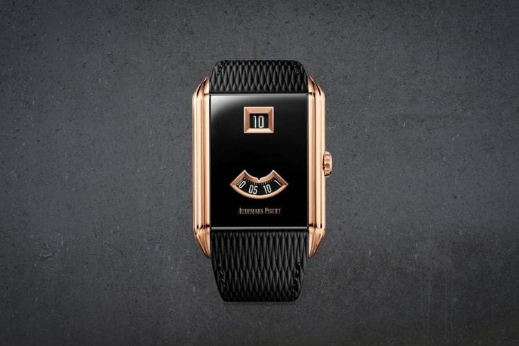 Novità Audemars Piguet 2026 - Jumping Hour Oro Rosa Novità Audemars Piguet 2026: il nuovo orologio Jumping Hour con cassa rettangolare in oro rosa e visualizzazione digitale a finestre.
