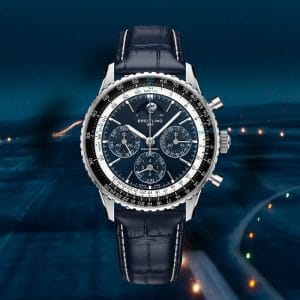Breitling Navitimer B19 Chronograph 43 Perpetual Calendar in platino con quadrante blu, cinturino in alligatore blu navy, su sfondo di pista aeroportuale notturna.