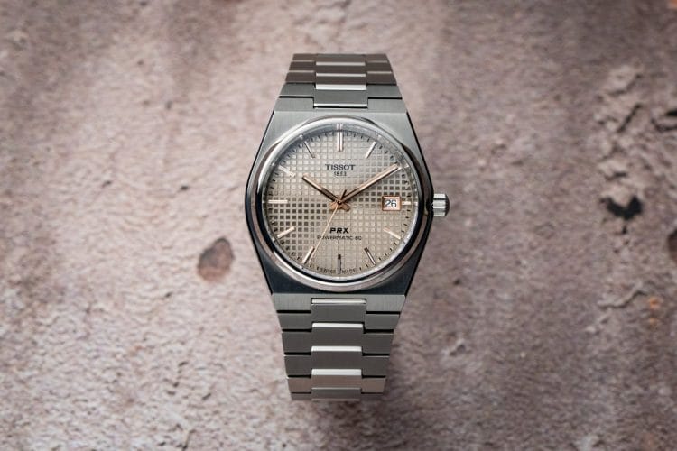 Tissot PRX Powermatic 80 – Swatch Group vs Morgan Stanley Swiss Watcher 2025 Tissot PRX Powermatic 80, uno dei modelli Swatch Group al centro del confronto tra i dati reali del gruppo e le stime del report Morgan Stanley Swiss Watcher 2025.