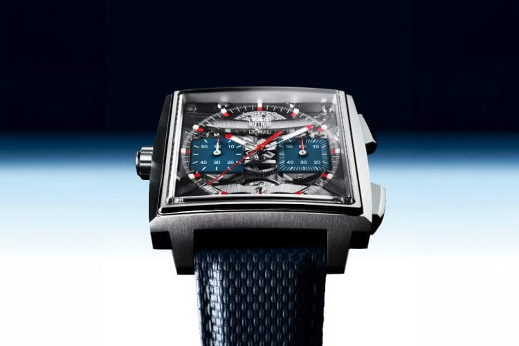 TAG Heuer Monaco Evergraph – Watches and Wonders 2026 TAG Heuer Monaco Evergraph 2026: cronografo in titanio con calibro TH80-00 a componenti flessibili bistabili, quadrante scheletrato con contatori blu e accenti rossi, presentato a Watches and Wonders 2026.