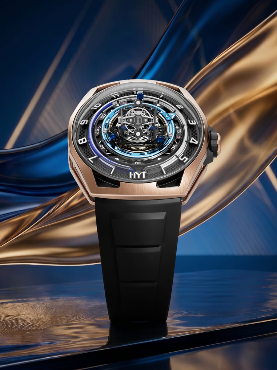 HYT Conical Tourbillon Midnight Blue - cassa in oro 5N HYT Conical Tourbillon Midnight Blue vista tre quarti: cassa bicolore in oro 5N e titanio DLC nero con cinturino in gomma