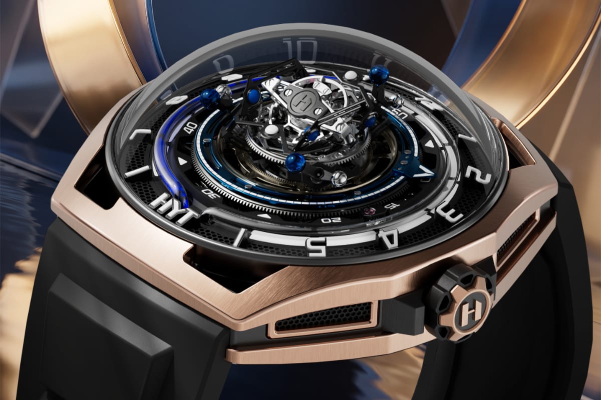 HYT Conical Tourbillon Midnight Blue - dettaglio cassa e corona HYT Conical Tourbillon Midnight Blue, dettaglio laterale della cassa in oro 5N con corona in titanio DLC e cristallo zaffiro a cupola