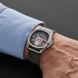 Mido Multifort TV Big Date Alebrijes al polso con bracciale in maglia milanese.