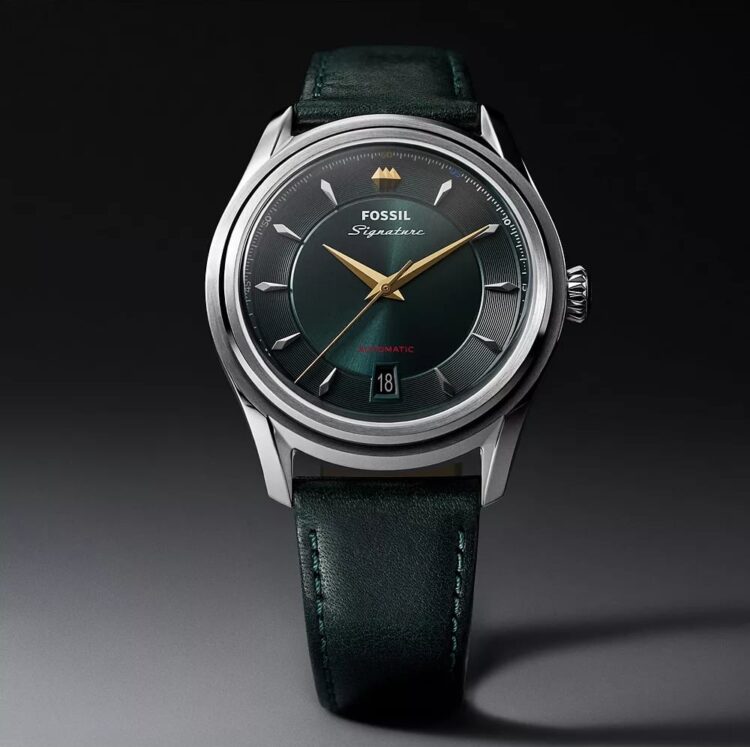 Fossil Signature CS-1 automatico svizzero quadrante verde lancette dorate cinturino pelle verde.
